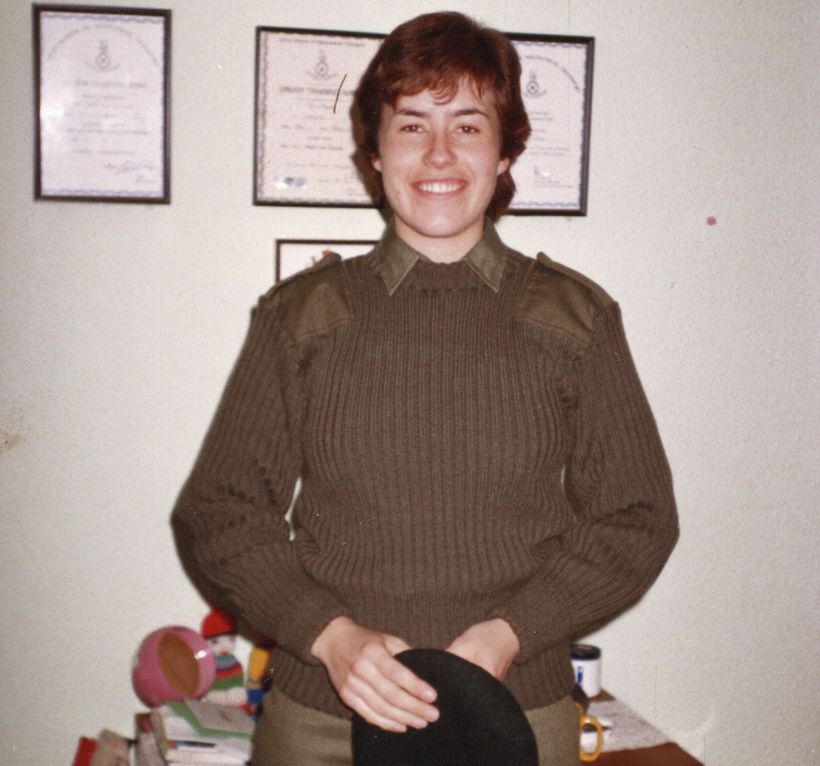Jean standing in her Army uniform smiling