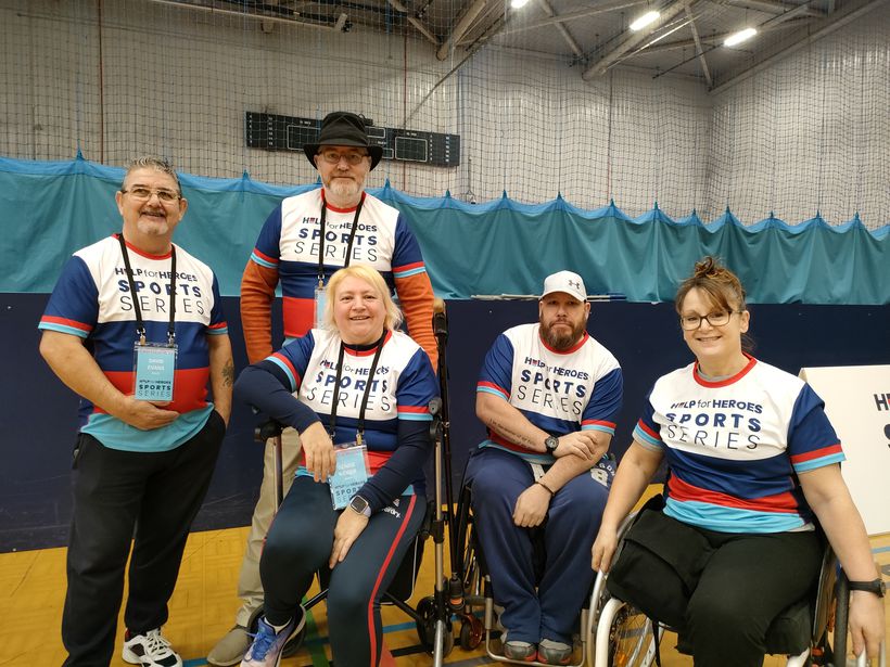 Veterans at the Community Sport Series Games. From left David (standing), Martin (standing), Denise, 'H' (David), and Natalie. - Credit: Help for Heroes. Group shot of veterans at the sports event.