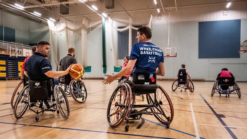 two men playing wheelchair rugby